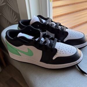 Kids Nike Black and White Sneakers with Green Accents